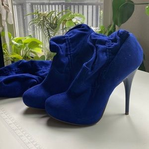 Blue ultra suede thigh high boots with studded tie top.
